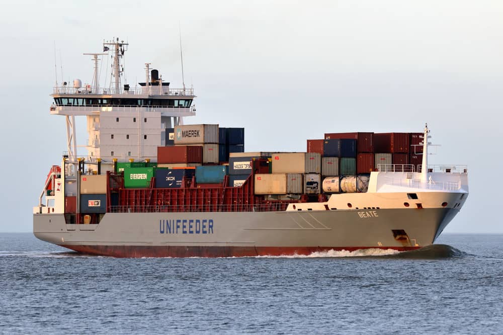 A container ship operated by Unifeeder passes Cuxhaven, Germany